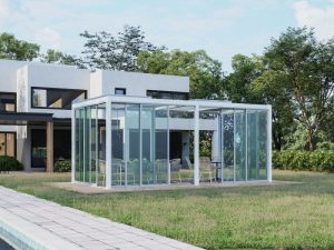 Glass-enclosed pergola with white frame, creating a sleek outdoor lounge area by the poolside.