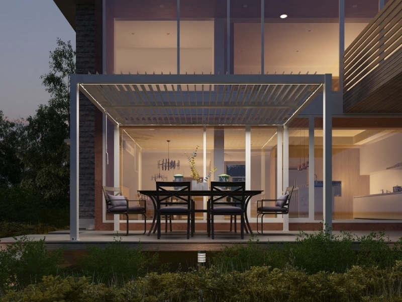 Modern outdoor dining pergola at dusk showing lighting ideas before adding Festoon Lights On Pergola for ambience.