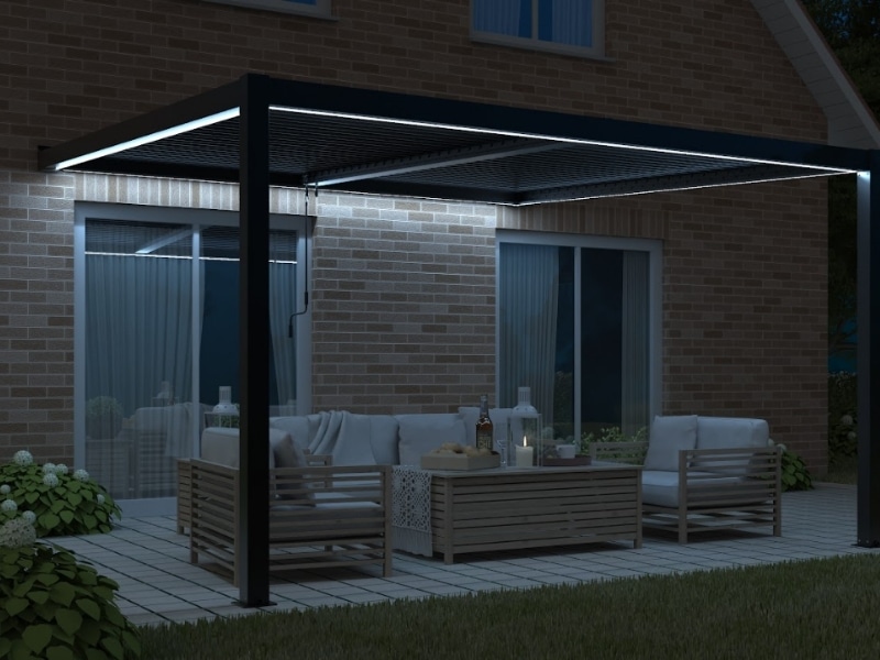 Outdoor seating beneath illuminated pergola, ideal setting for installing Festoon Lights On Pergola for added atmosphere.