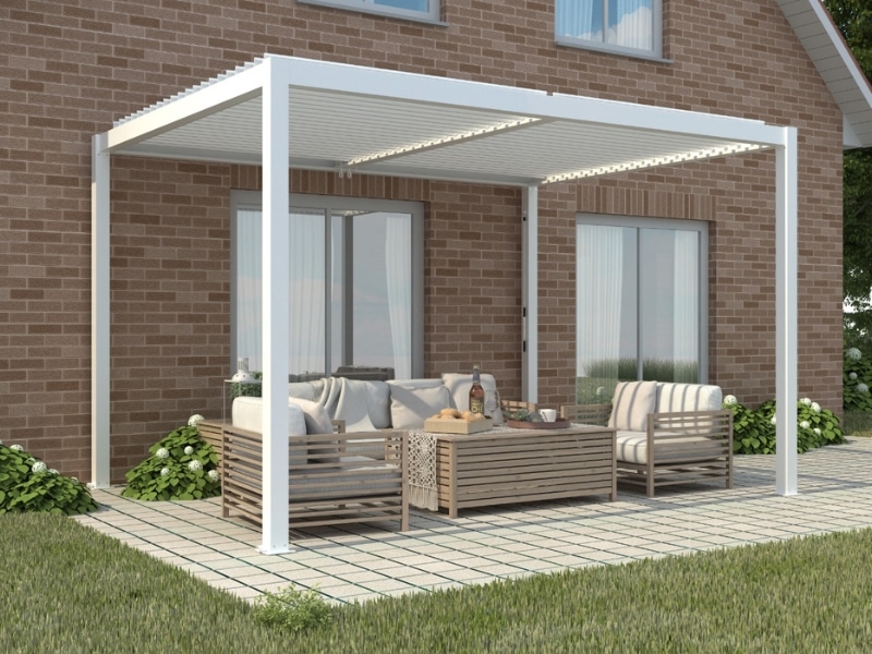 Modern white pergola over outdoor seating area showing potential Leaking Pergola Roof issues in residential backyard.