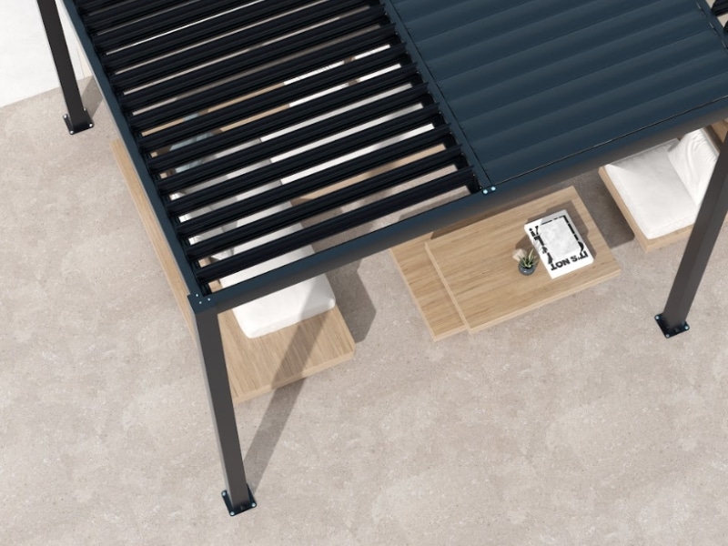 Pergola Footings supporting partially open louvered pergola above outdoor lounge furniture.