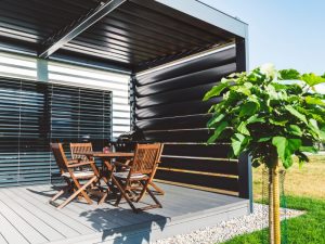 Modern aluminium pergola with a sleek design, illustrating the best pergola material for a contemporary outdoor space.