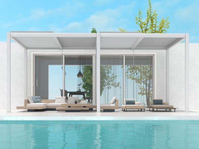 Poolside pergola ideas featured with white pergola providing shaded lounging beside clear blue pool.