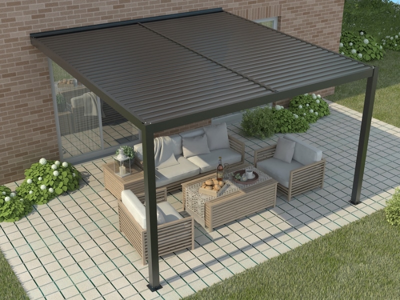 Motorised Pergola Pet Safety shown with covered outdoor seating beneath attached motorised pergola beside brick home.