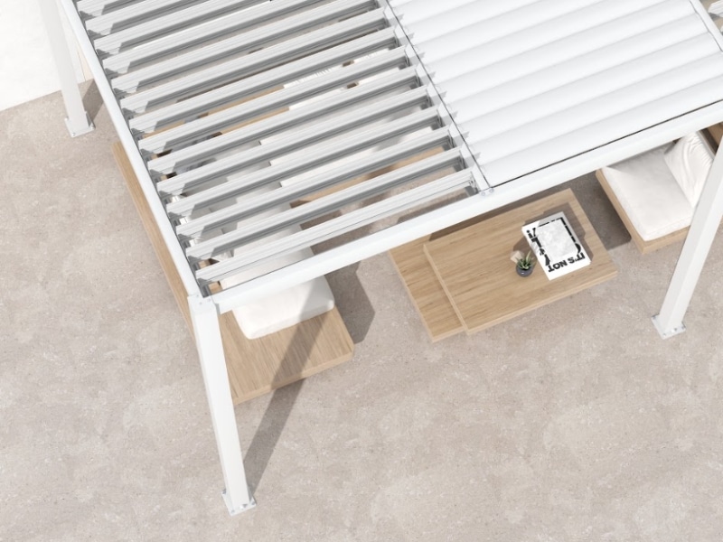 Top view of Anchor Pergola attached to concrete with adjustable louvre roof and wooden outdoor furniture.