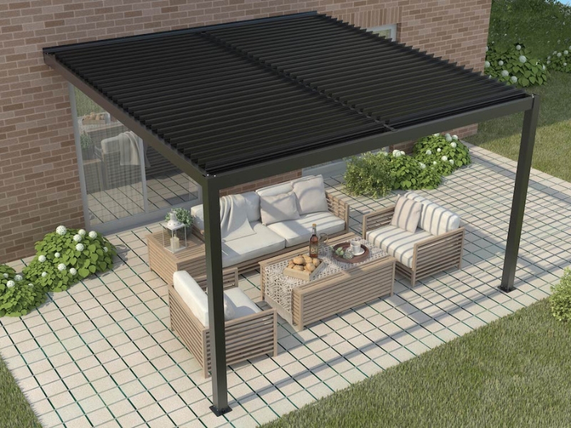 Black portable pergola kits covering timber lounge furniture on a tiled patio beside a brick house