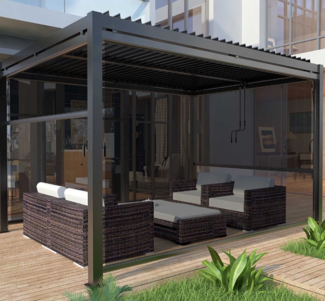 Manual Pergolas Modern black manual pergola with louvre roof and outdoor wicker seating, showcasing elegant and functional manual pergolas.
