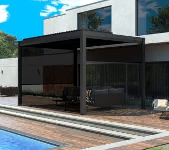 Side view of black pergola with manual pull up screens, offering flexible shade and privacy for a modern poolside area.