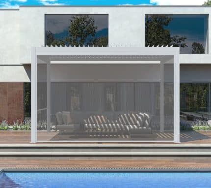 White pergola with manual pull up screens by the pool, offering elegant shade and privacy in a modern outdoor space.
