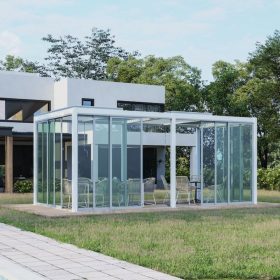 Modern glass enclosure in backyard with lounge seating, a stylish and functional outdoor living add on for contemporary homes.
