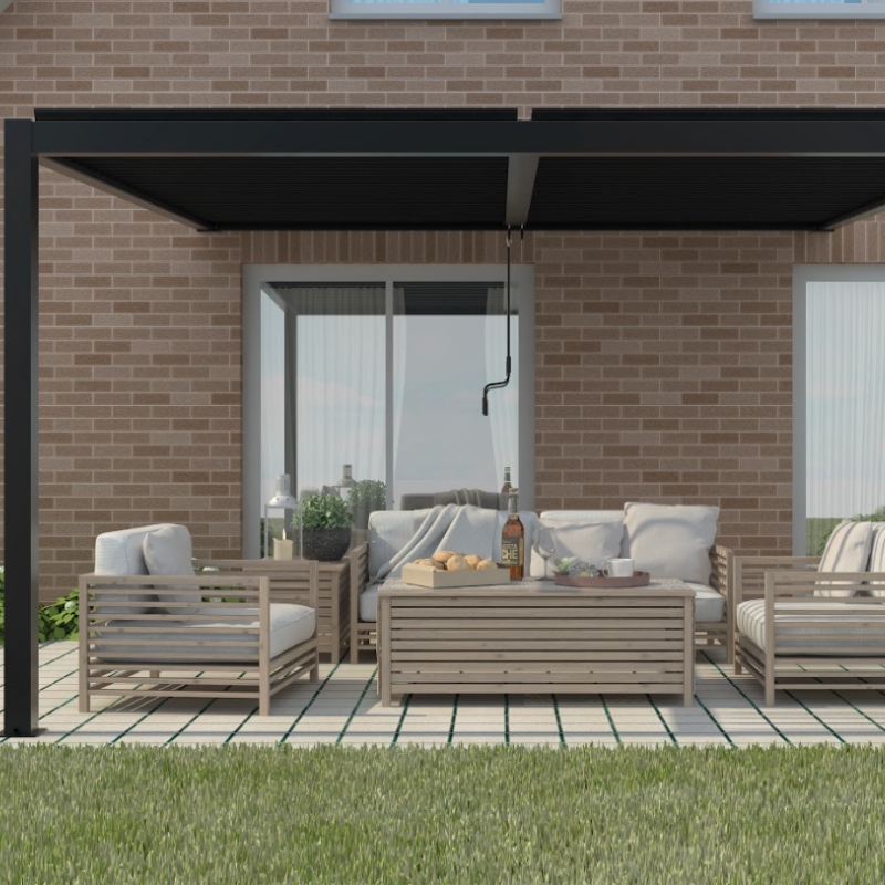 Modern black pergola kits over outdoor seating area with timber furniture against brick house wall